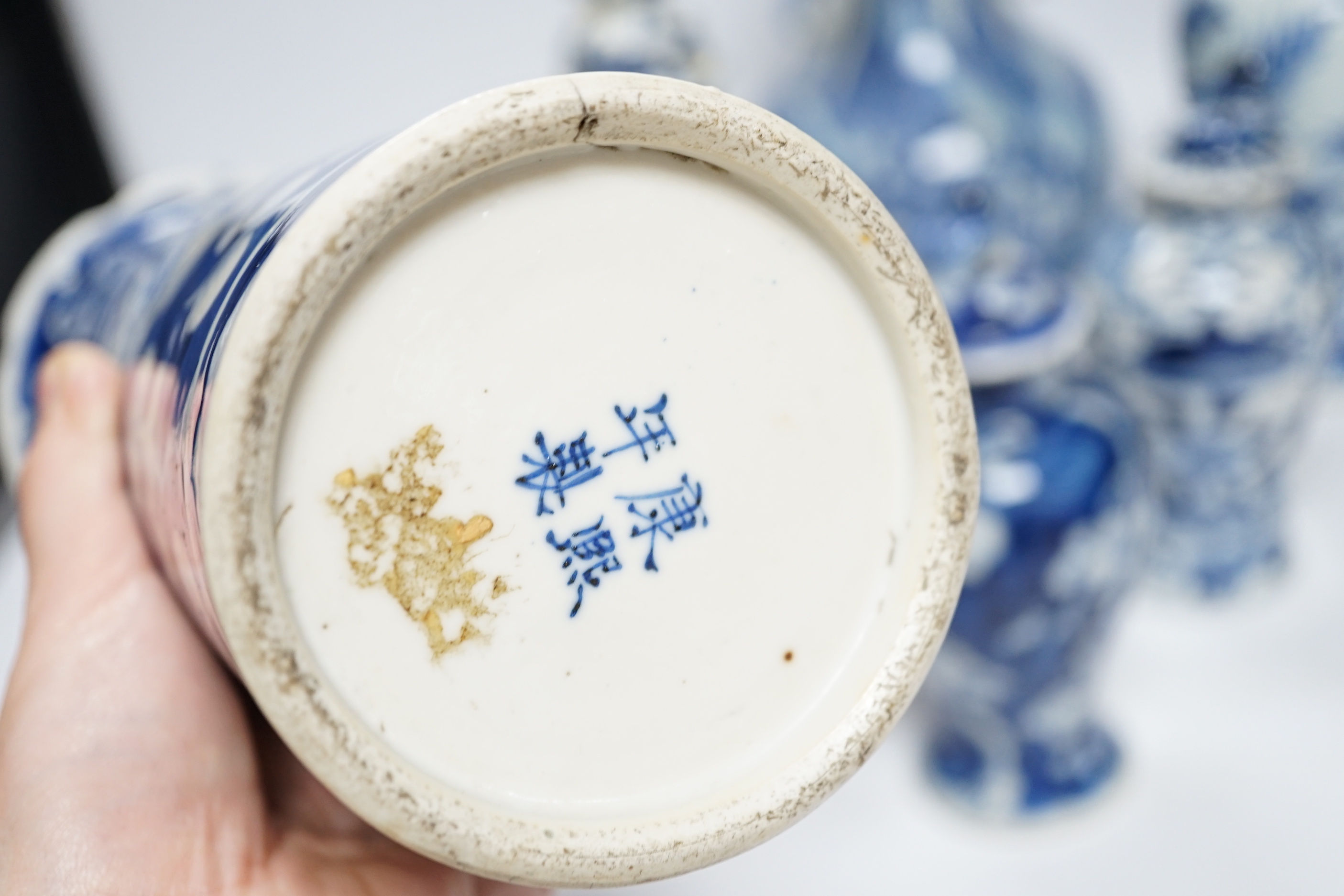 A late 19th century Chinese blue and white twin elephant head handle vase and five other 19th century Chinese blue and white vases, tallest 26cm